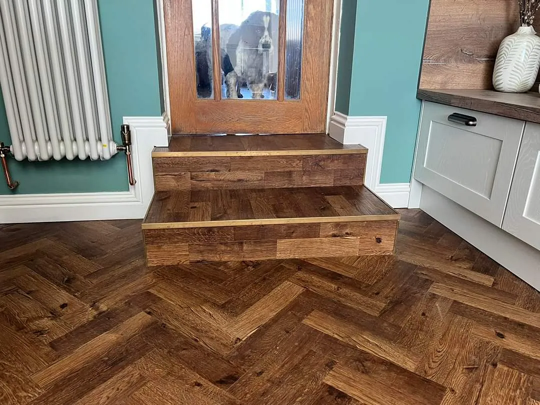 Finished luxury vinyl tile flooring in a fitted room
