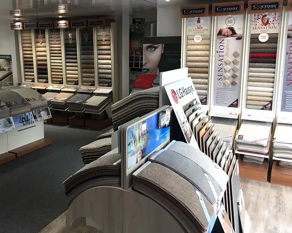 Inside the Carpet Room showroom with flooring displays